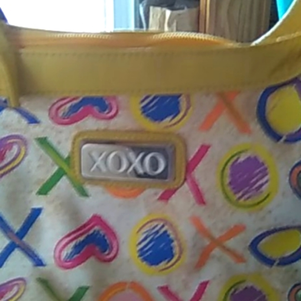 A bag with lots of colors with a pattern XOXO